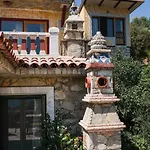 Symbola Ολουντενίζ